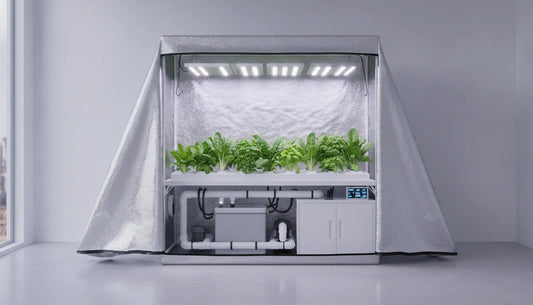 A clean modern reflective grow tent with green leafy plants inside under high-tech LED grow lights